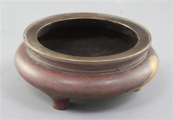 A Chinese gilt splashed bronze tripod censer, Ding, diameter 13cm